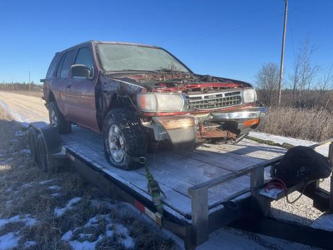 Old SUV on Trailer for Scrap Metal Recycling