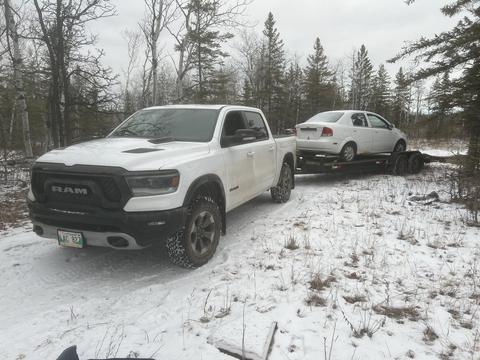 Efficient Scrap Car Towing in Snowy Terrain by Recycling Business